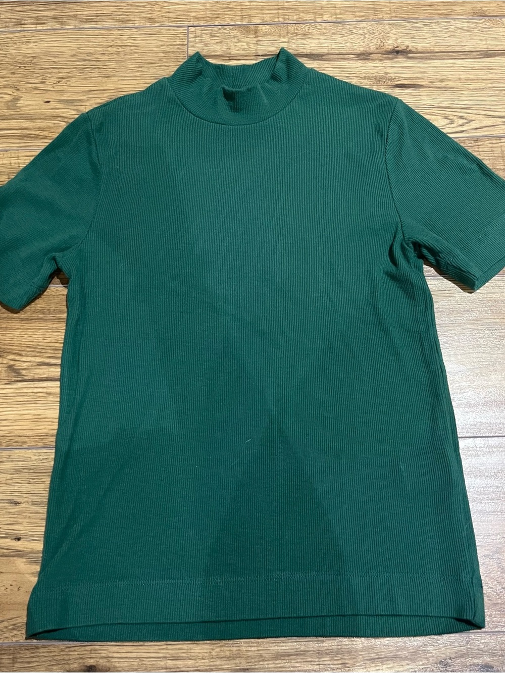 Woman’s Green Short-Sleeve Mock Neck Top